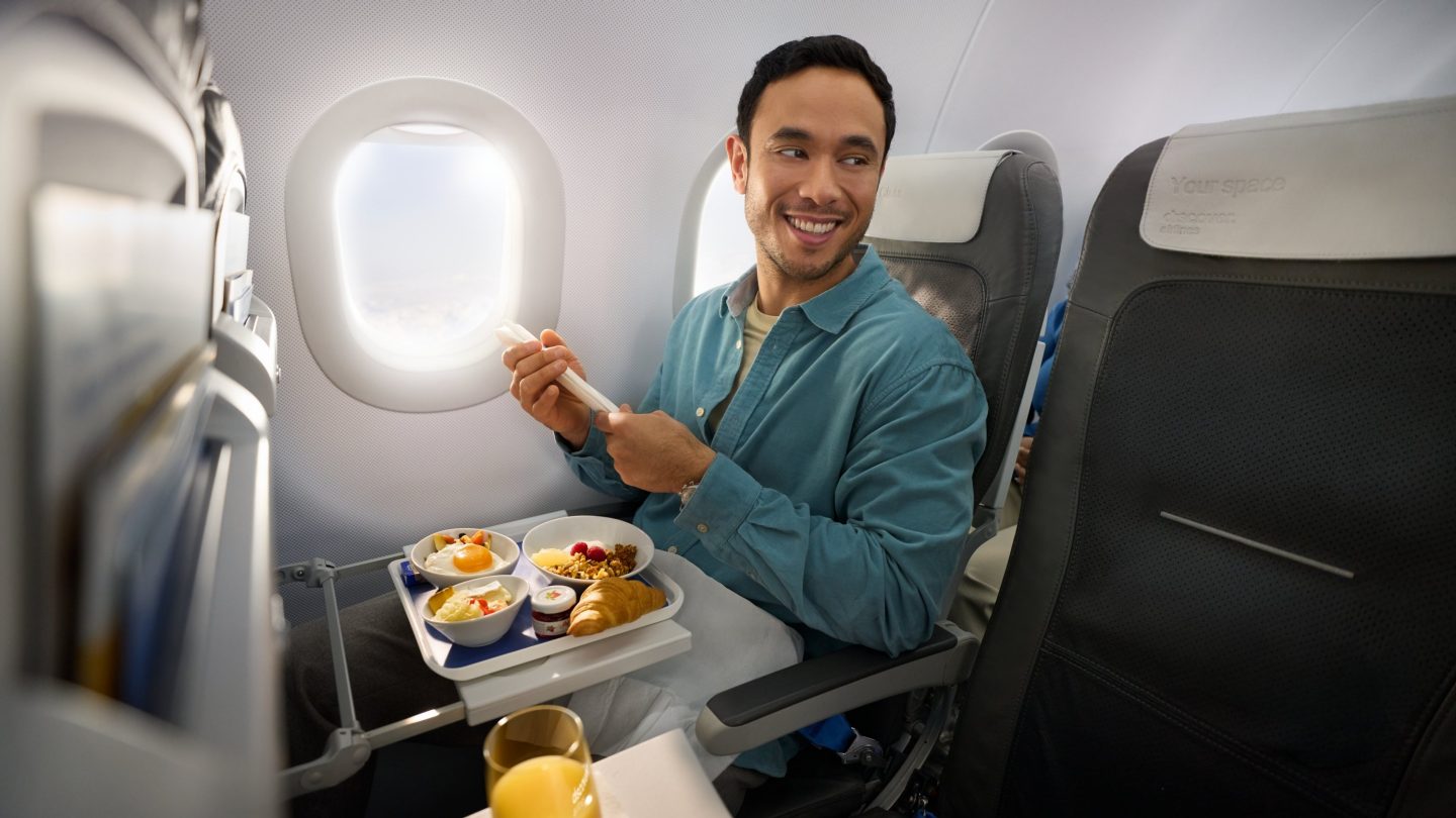 Un homme en Business Class dans un A320-200