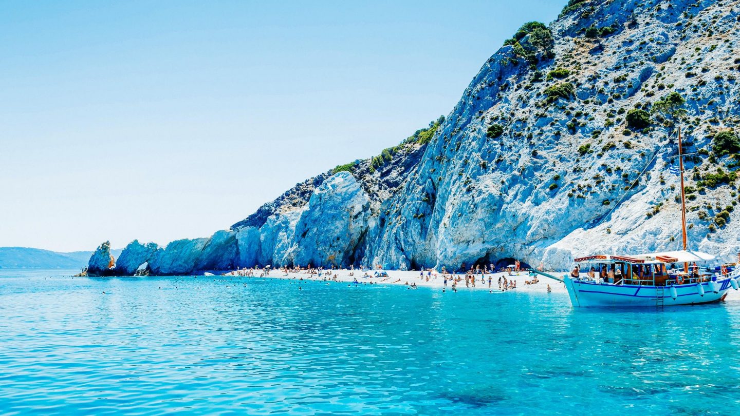 Skiathos beach with panoramic mountains in the background