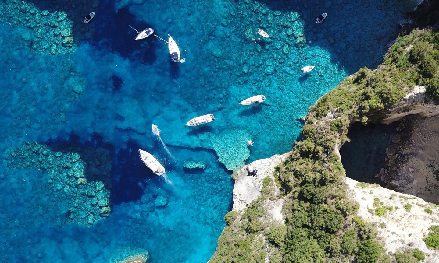 A bird’s eye view of blue water in Agni Bay, Corfu