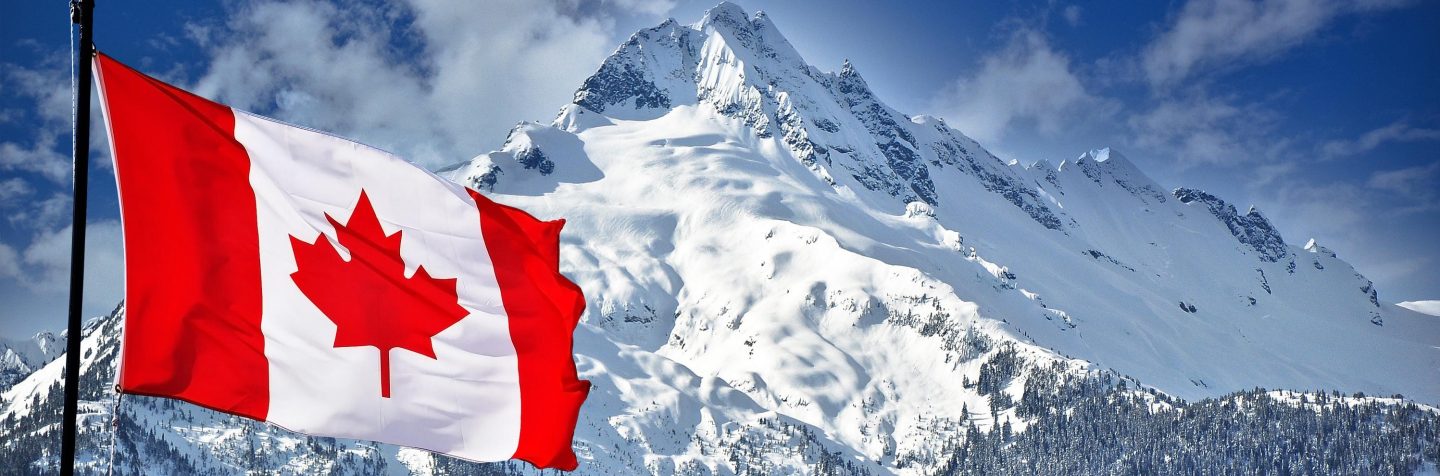 Flag of Canada Flag of Canada in front of a mountain