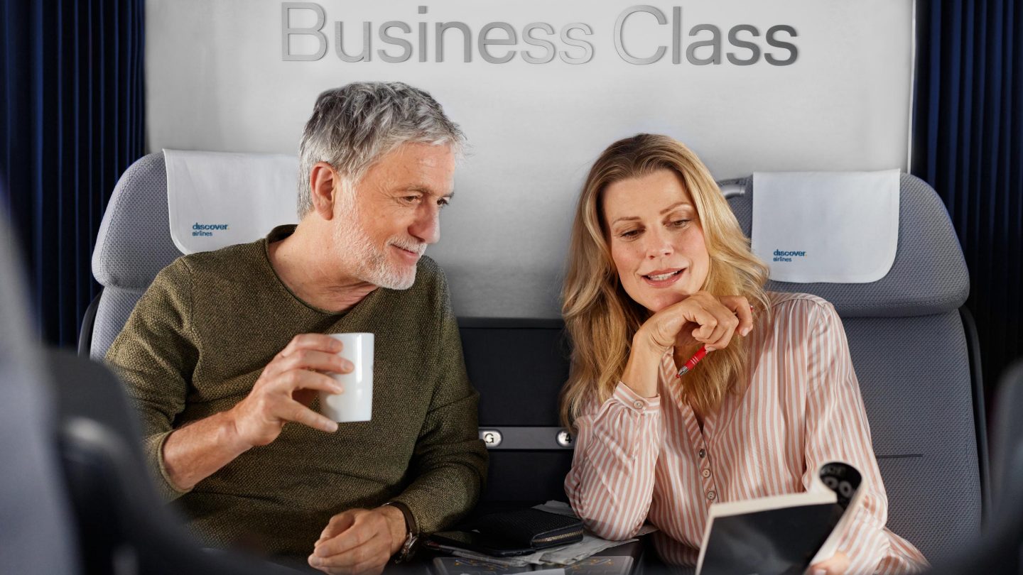 Onboard shop Two passengers are looking at products