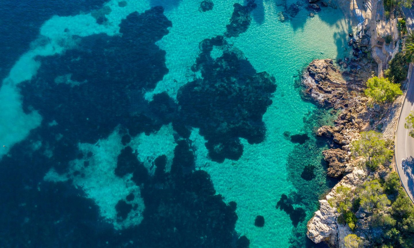 Turquoise-colored sea from above