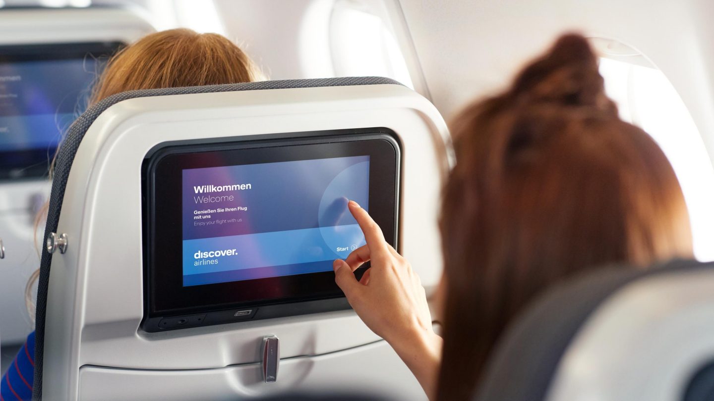 A passenger using the entertainment service on board
