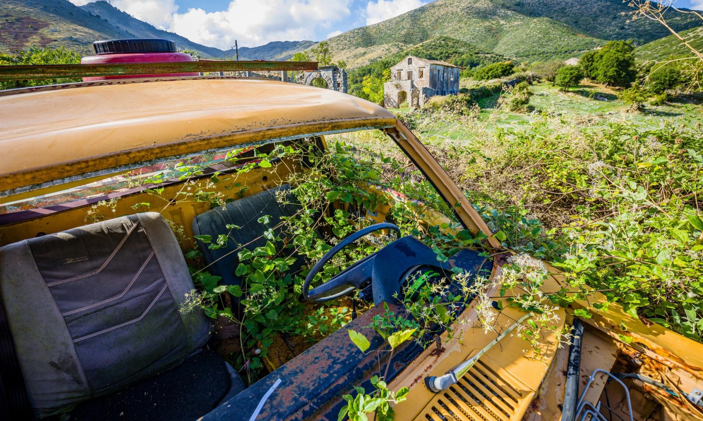 Weathered car in a great landscape on Corfu
