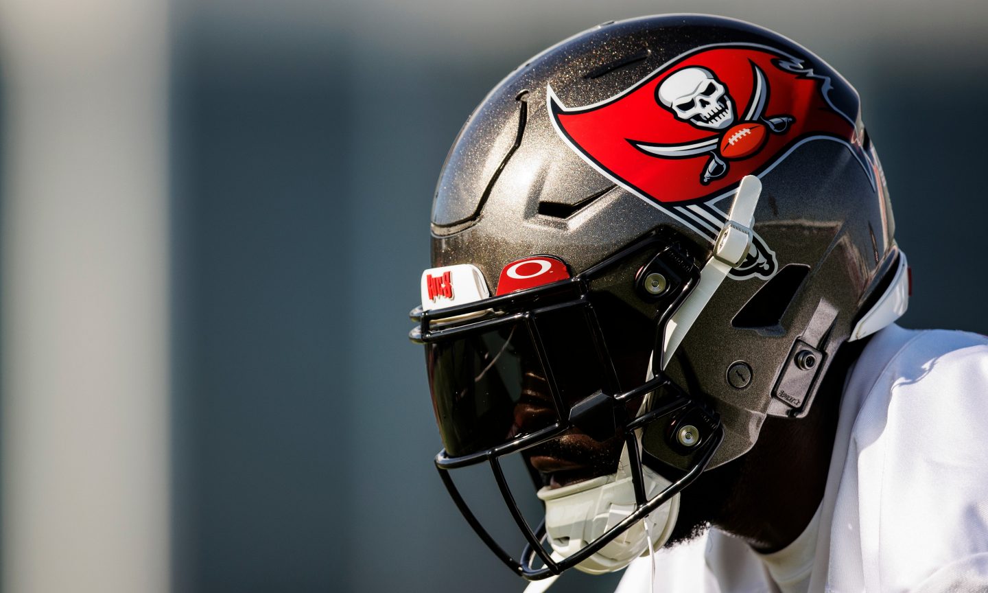 A Buccaneers player with a helmet