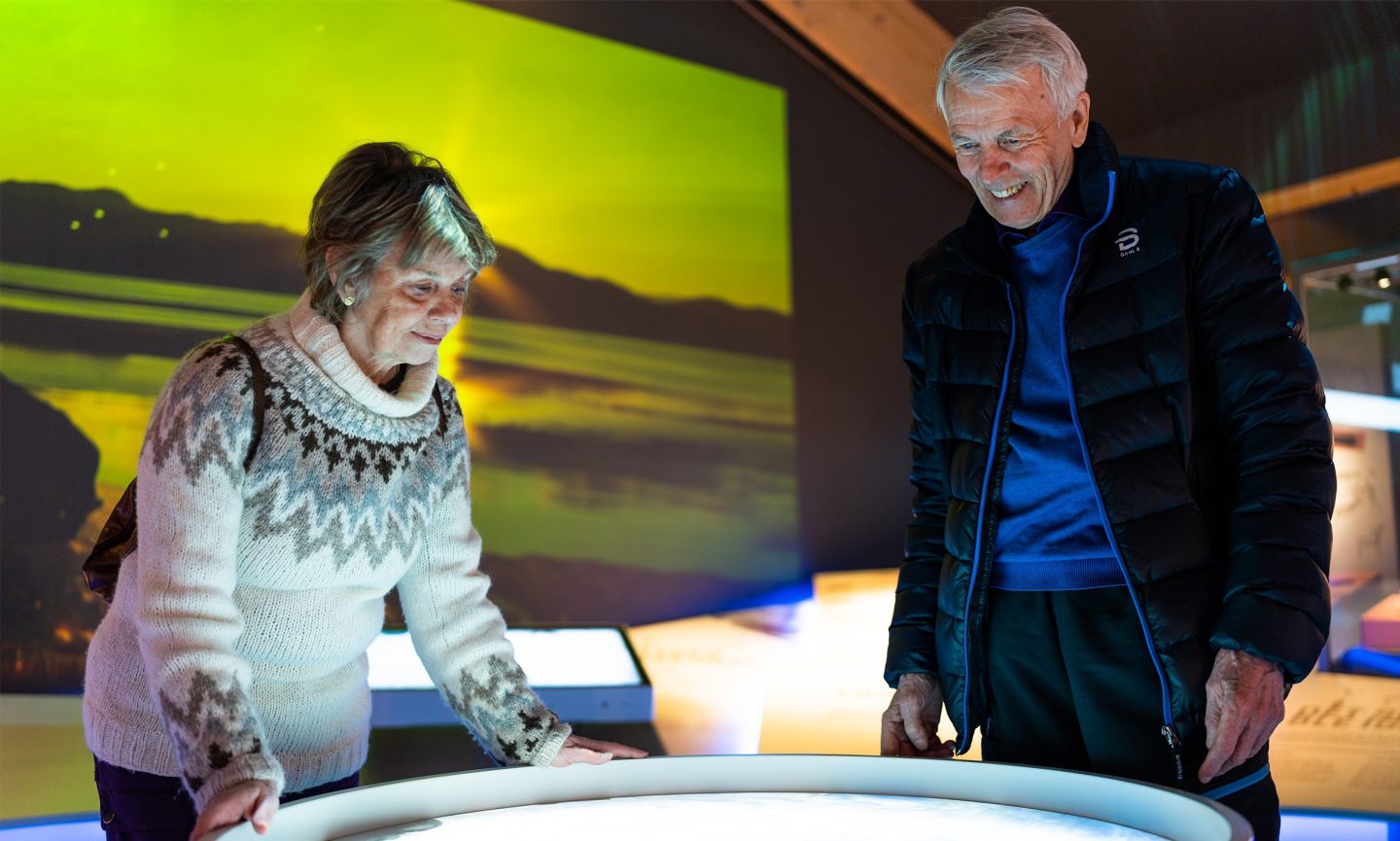 Two people in a museum