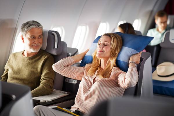 Couple sitting in Business Class Longhaul